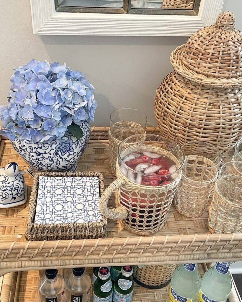 rattan coastal bar cart with hydrangeas